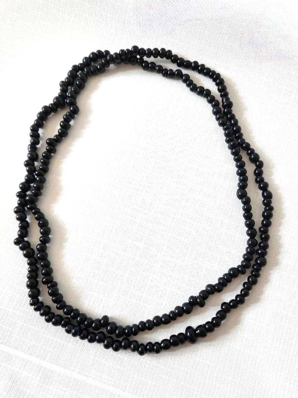 Vintage long black glass bead necklace